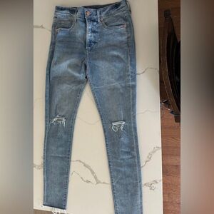 EXPRESS skinny jeans. Mid rise. Distressed. Size 8L